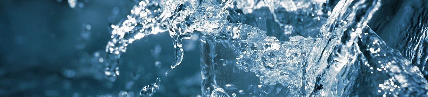 Water splashed into glass