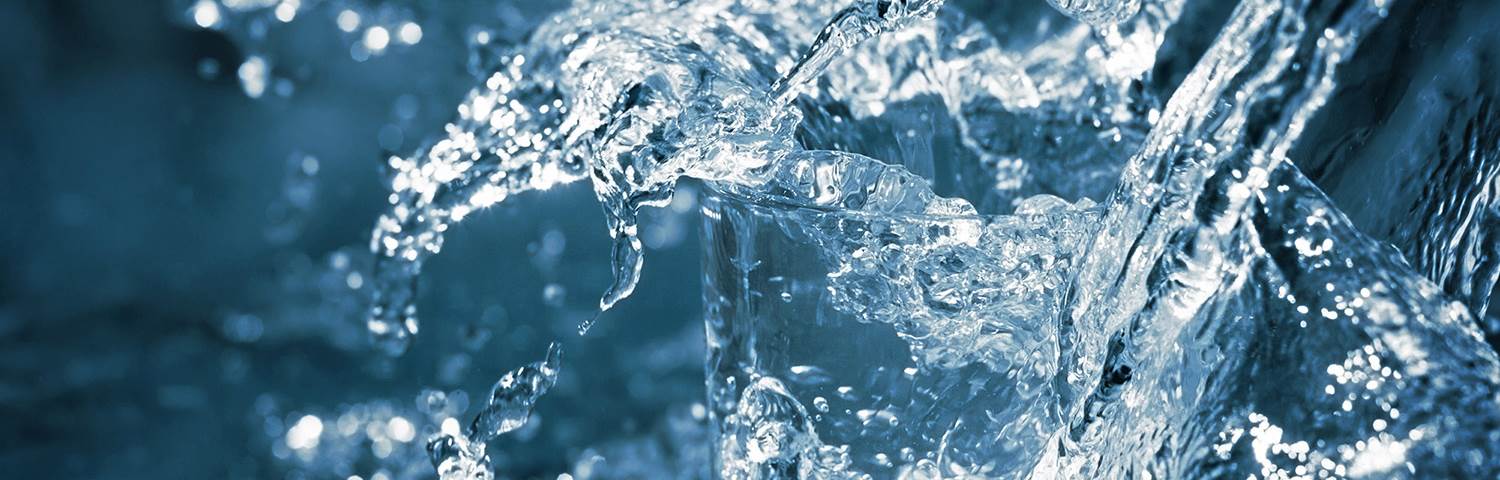 Water splashed into glass