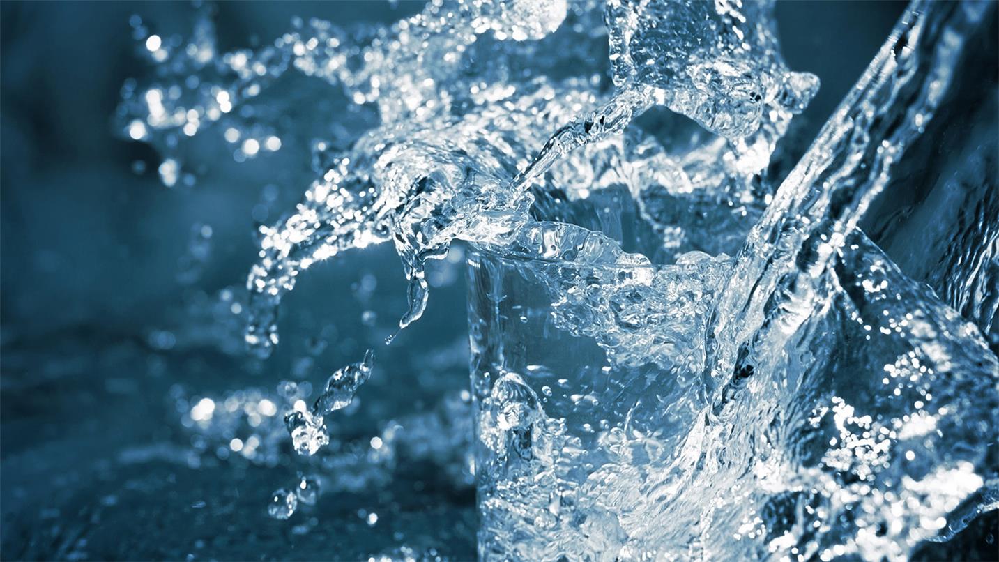 Water splashed into glass Water splashed into glass