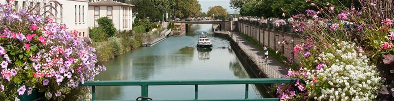 Real-time optimisation of network operations to reduce overflows and achieve compliance
